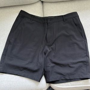 Black Puma golf shorts